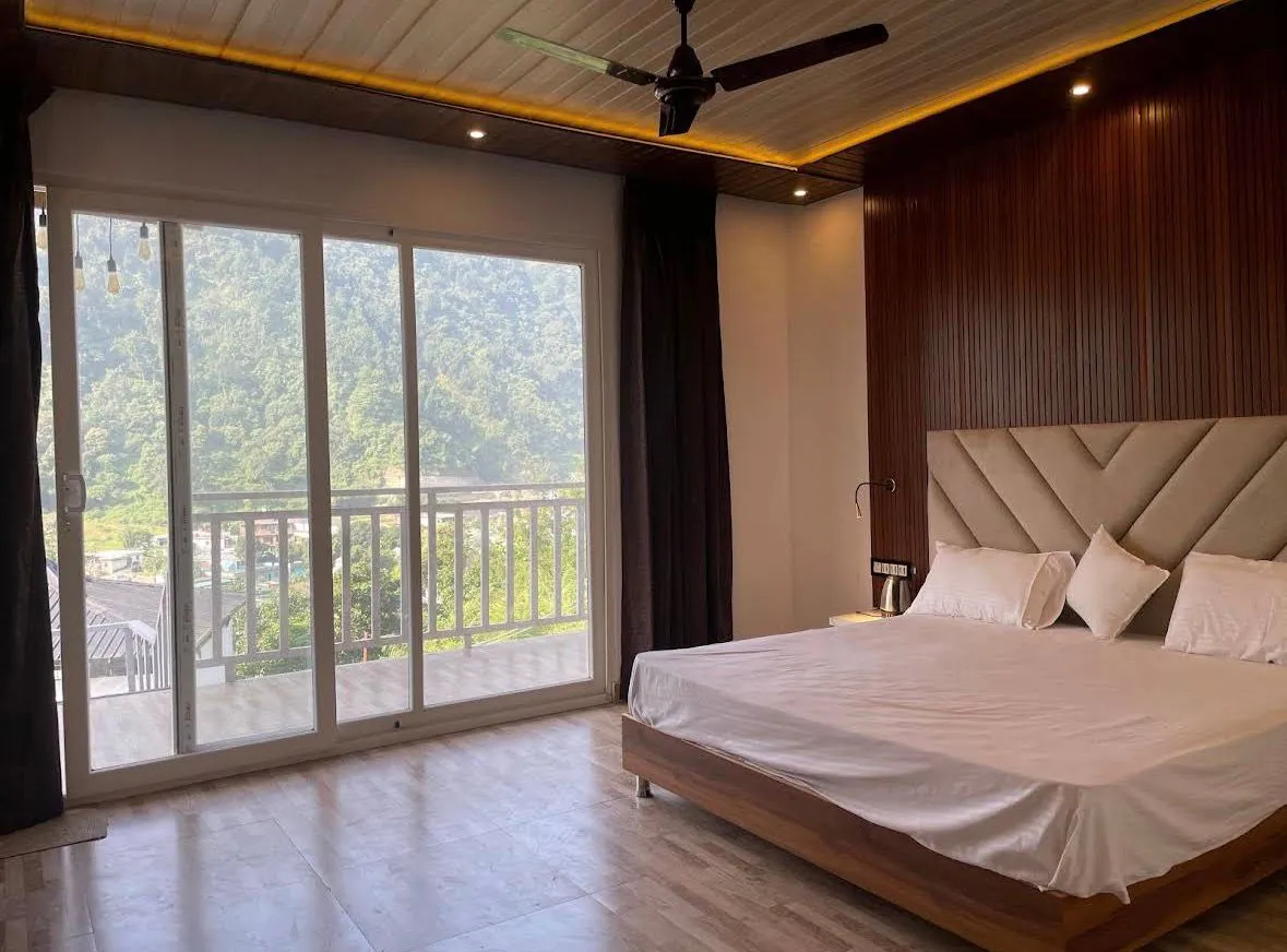 RS02 Naqsh Resort Rishikesh premium room with balcony and scenic mountain view