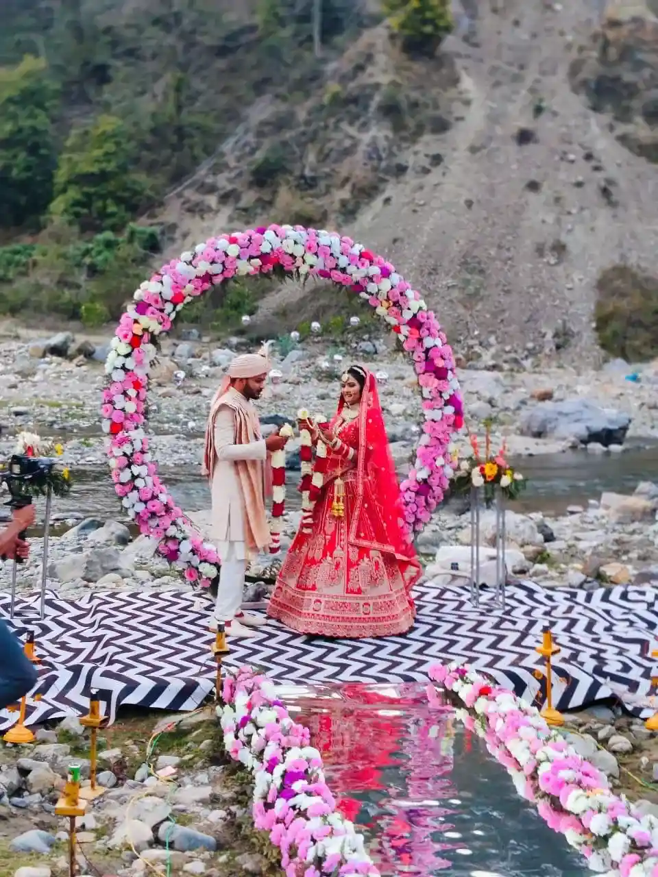 Riverside destination wedding ceremony at RS01 resort in Rishikesh with floral mandap
