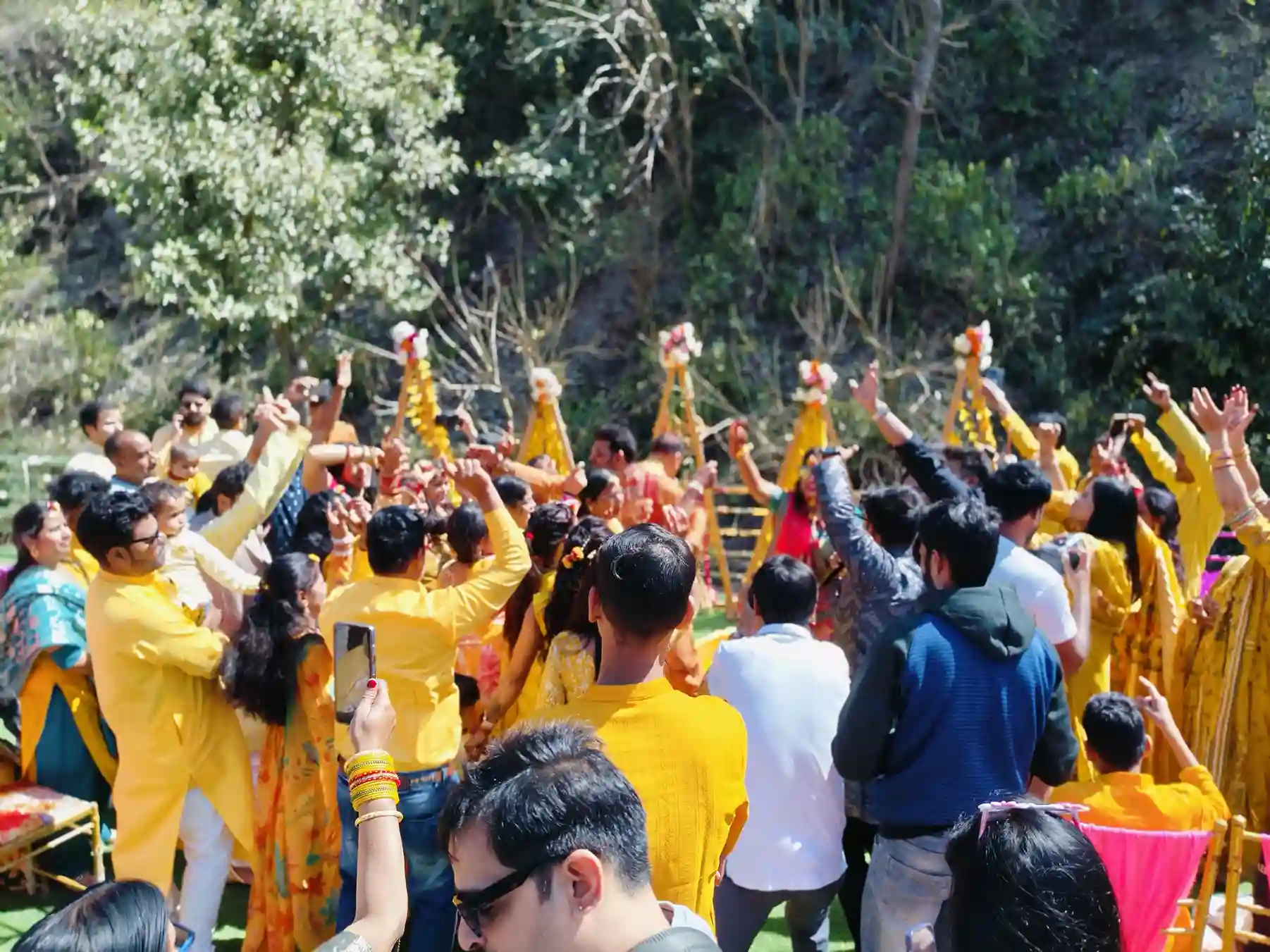 Wedding guests dancing during haldi ceremony at RS01 resort in Rishikesh